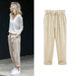 Women's trousers with elasticated waistband in plain colour / seven-quarter trousers