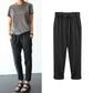 Women's trousers with elasticated waistband in plain colour / seven-quarter trousers